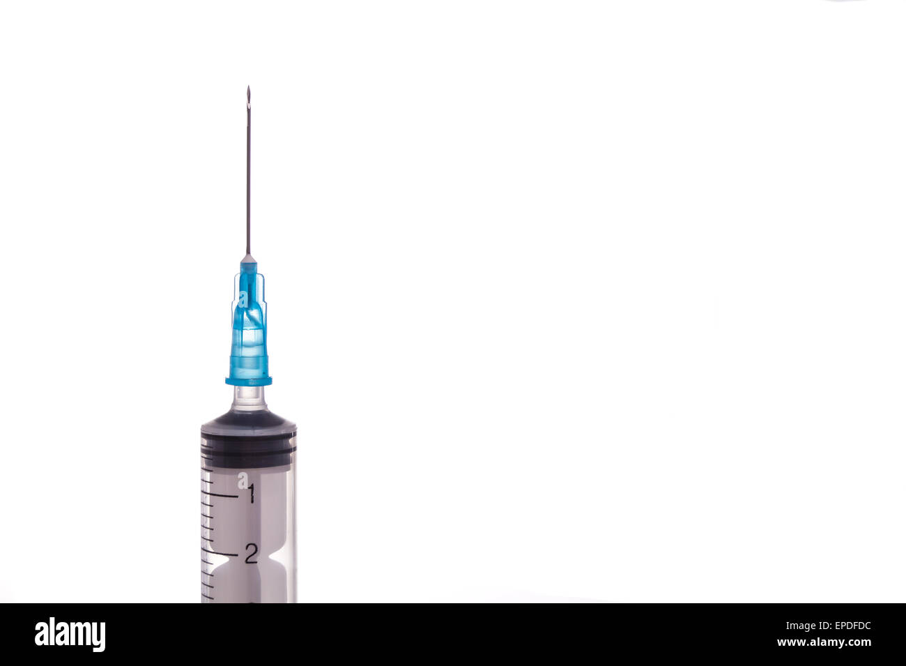 Syringe with needle, macro and isolated on white Stock Photo