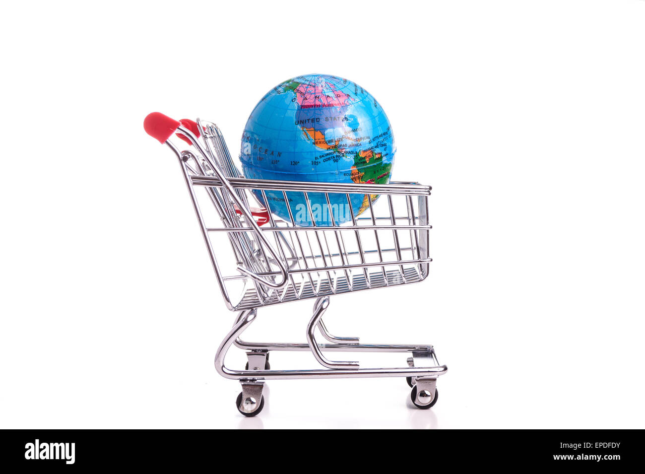 Buying the whole world and bring it home in a cart Stock Photo