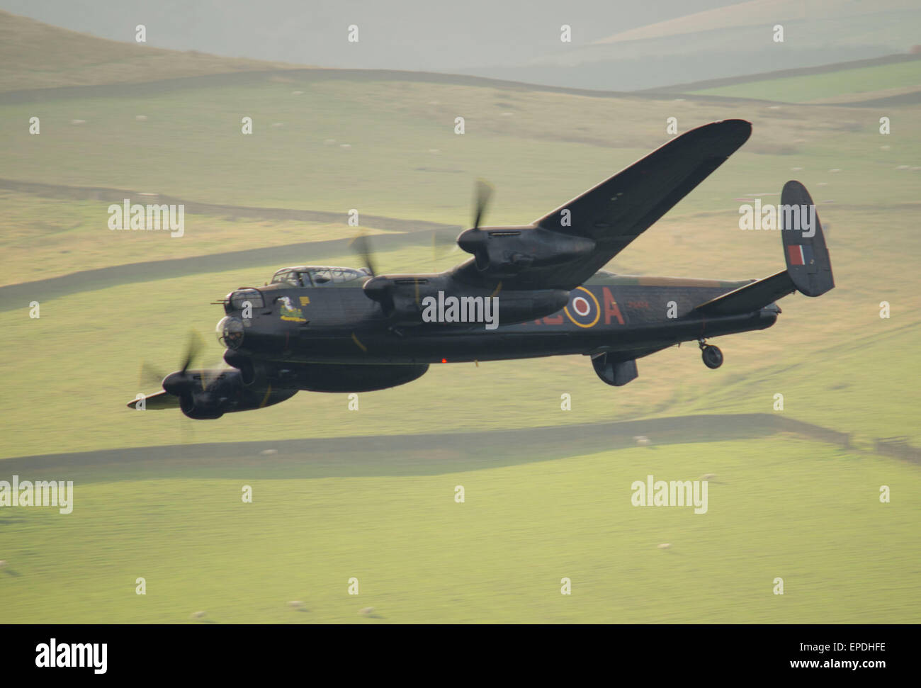 Pictured here is the Avro Lancaster Bomber VERA, taken over the Derwent Valley and the Ladybower reservoir where it was accompan Stock Photo