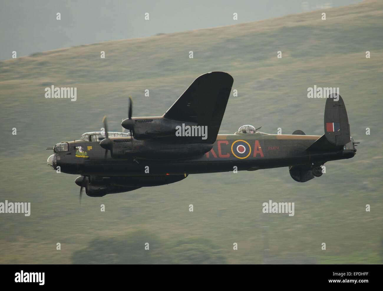 Pictured here is Avro Lancaster Bomber VERA, in flight over Ladybower Reservoir in the Derwent Valley, Derbyshire. Stock Photo