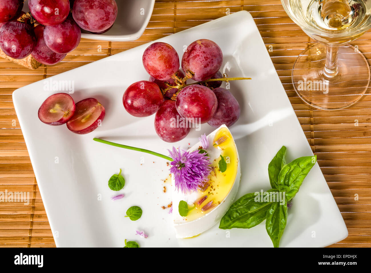Cheese, grapes and wine - delicate combination Stock Photo - Alamy