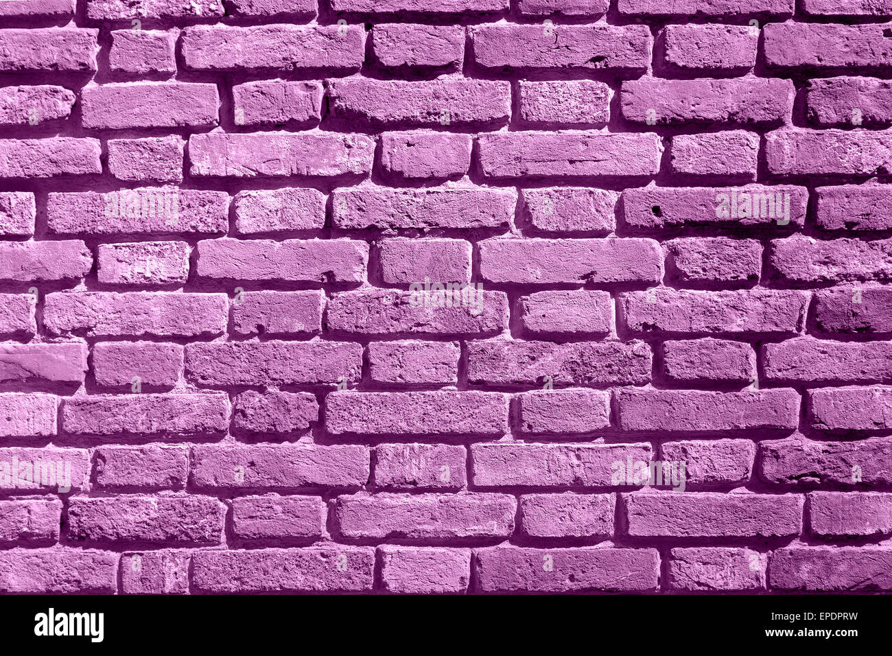 Background of purple brick wall pattern texture. Suitable for graffiti inscriptions as a textured effect on behind Stock Photo