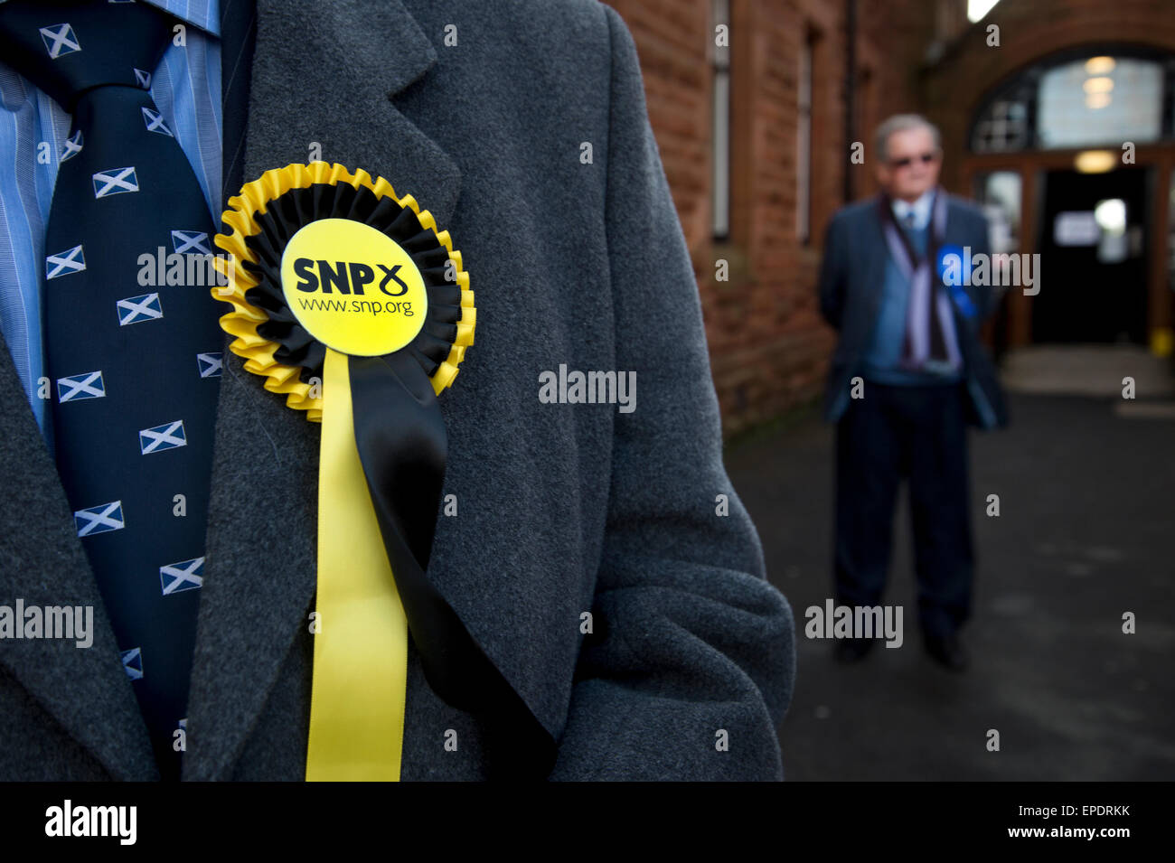 General election 2015. West Kilbride, Scotland. Observers at polling place from SNP, and Conservative parties Stock Photo