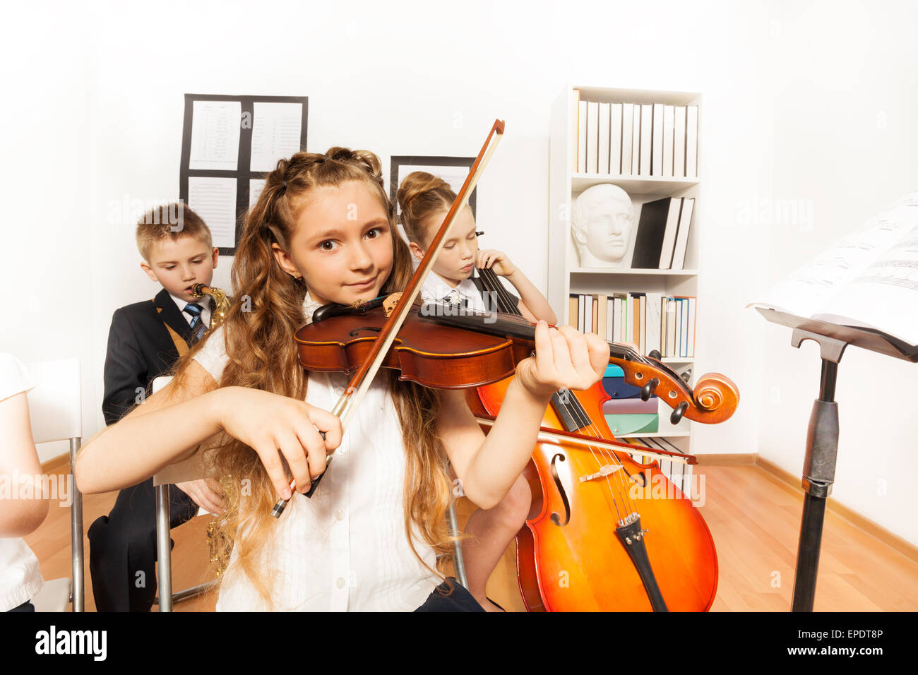 Performance Of Kids Playing Musical Instruments Stock Photo 82668342