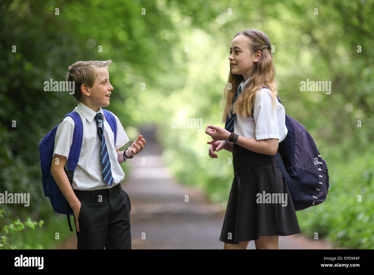 School uniform boy girl hi-res stock photography and images - Alamy