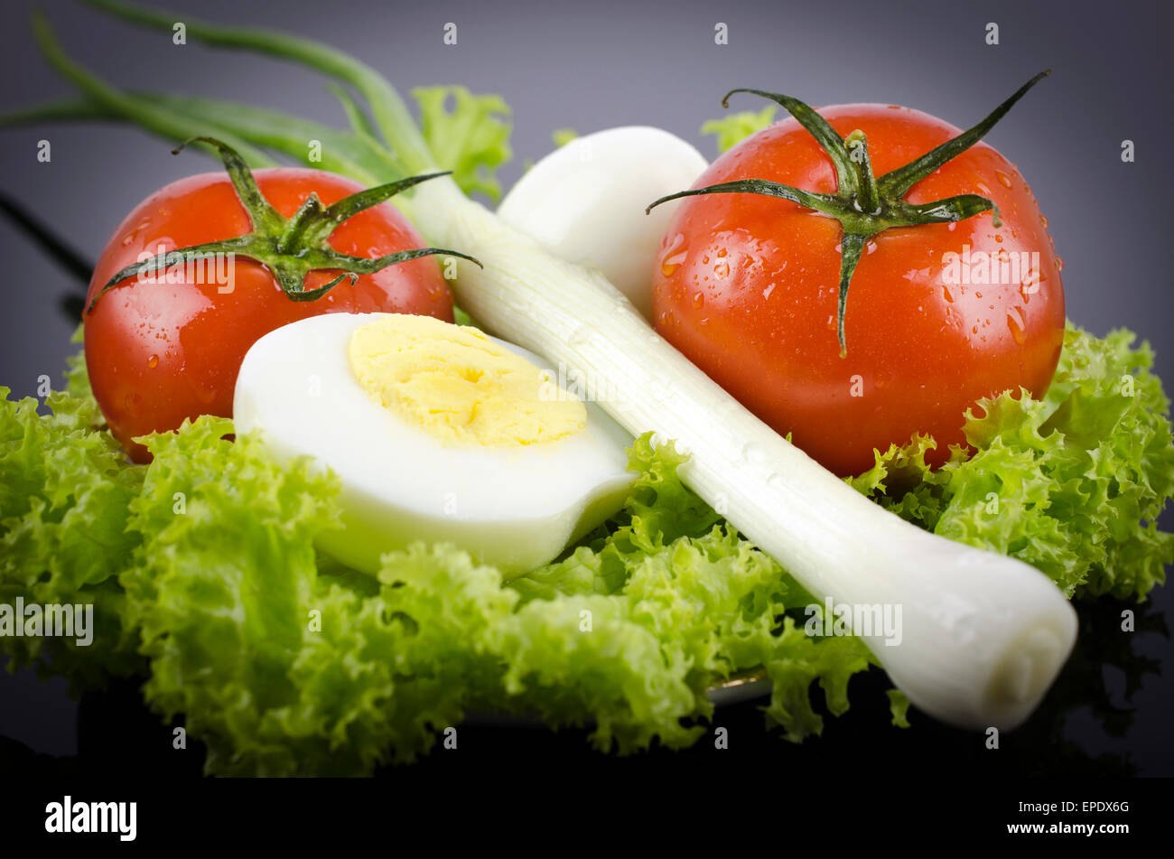 Lettuce, boiled egg tomato, onions Stock Photo Alamy