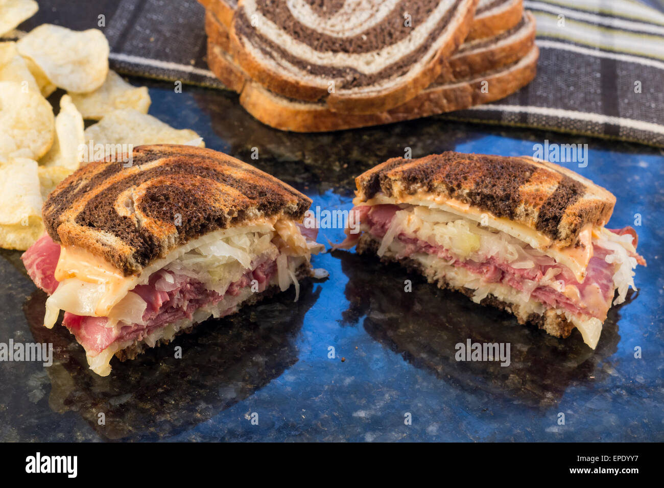 Classic reuben sandwich on pumpernickel swirl rye bread. A hearty meal