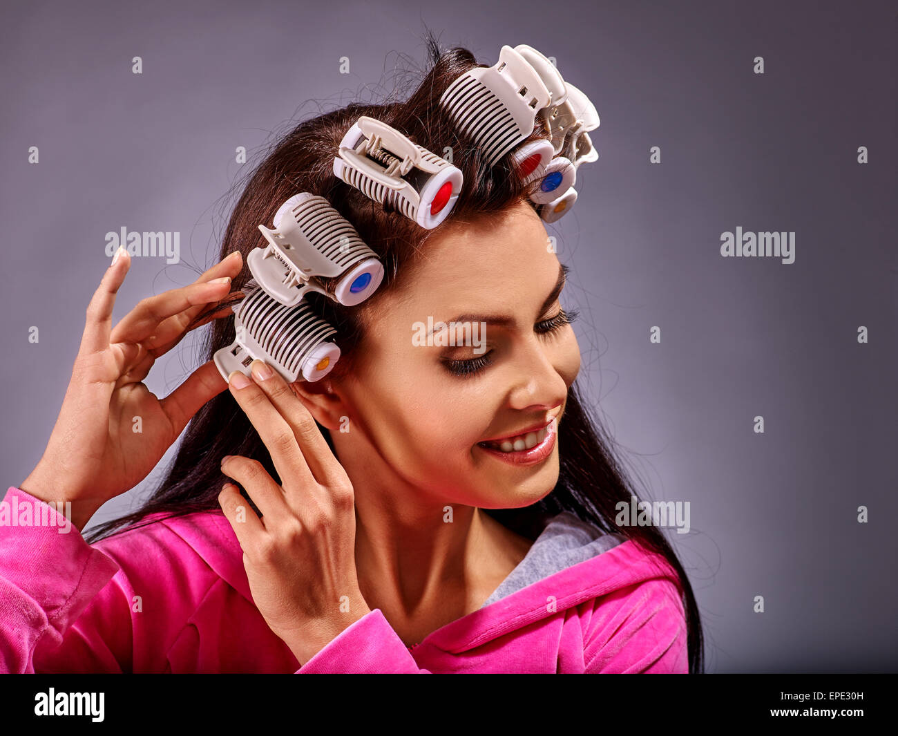 Woman wear hair curlers on head Stock Photo Alamy