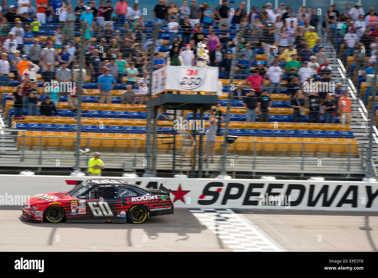 Newton, Iowa, USA. 14th Mar, 2015. Chris Buescher (60) crosses the finish line claiming victory at the NASCAR Xfinity Series 3M 250 at Iowa Speedway in Newton, Iowa. Credit:  csm/Alamy Live News Stock Photo