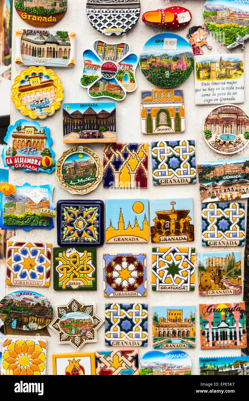 Colourful fridge tourist souvenirs of Granada displayed for sale