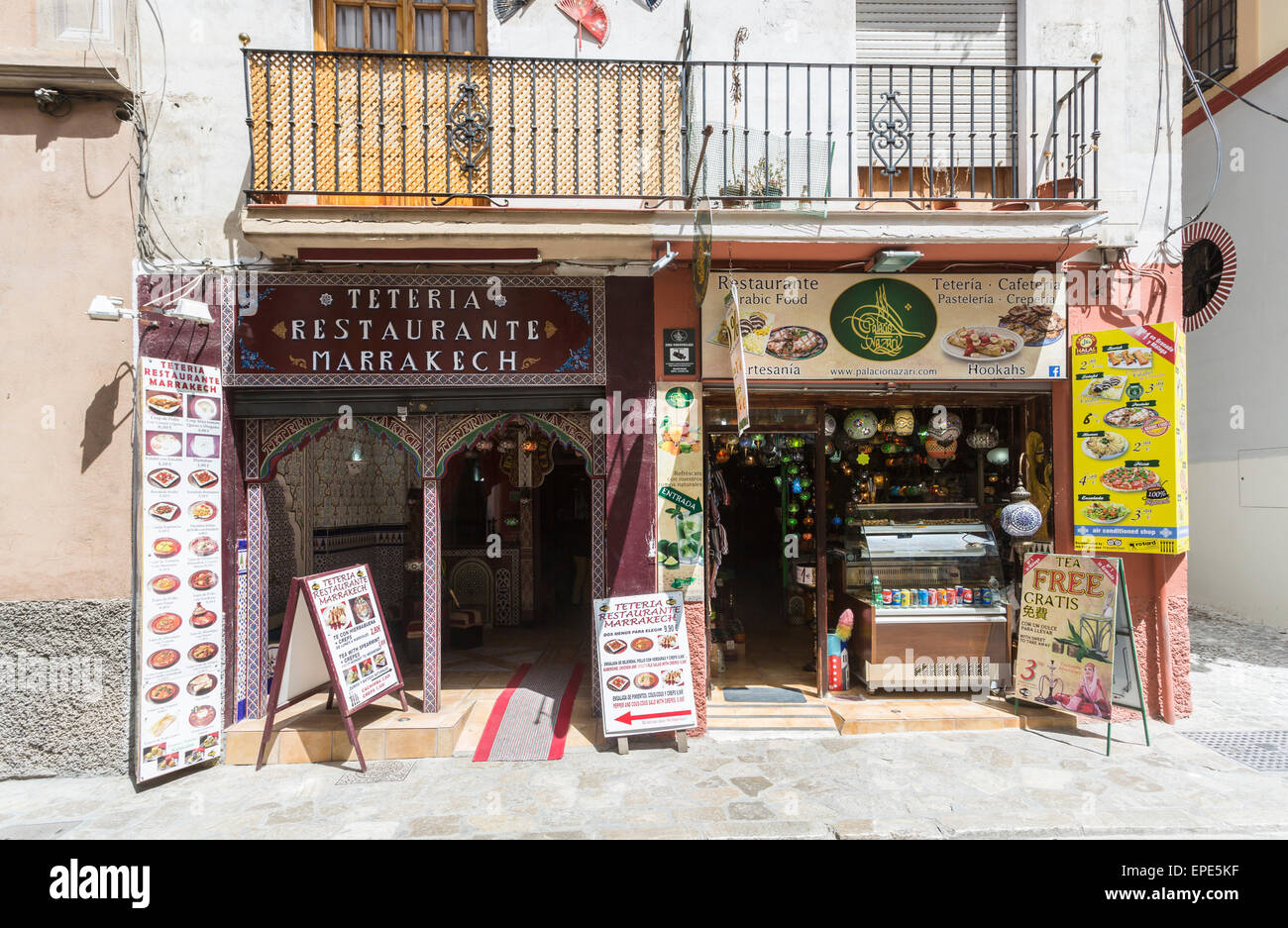 Sightseeing: Typical local restaurants serving Arabic food and souvenir shop in the Barrio Albaicin district of Granada, Andalusia southern Spain Stock Photo