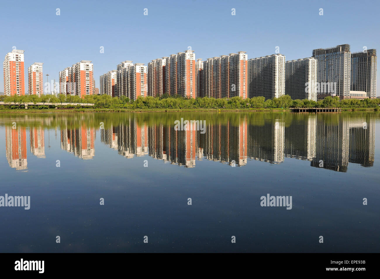 Taiyuan. 18th May, 2015. Photo taken on May 18, 2015 shows commercial residential buildings in Taiyuan, capital of north China's Shanxi Province. China's real estate market remained anemic with new home prices in April registering month-on-month declines in 48 of the 70 surveyed cities. © Zhan Yan/Xinhua/Alamy Live News Stock Photo