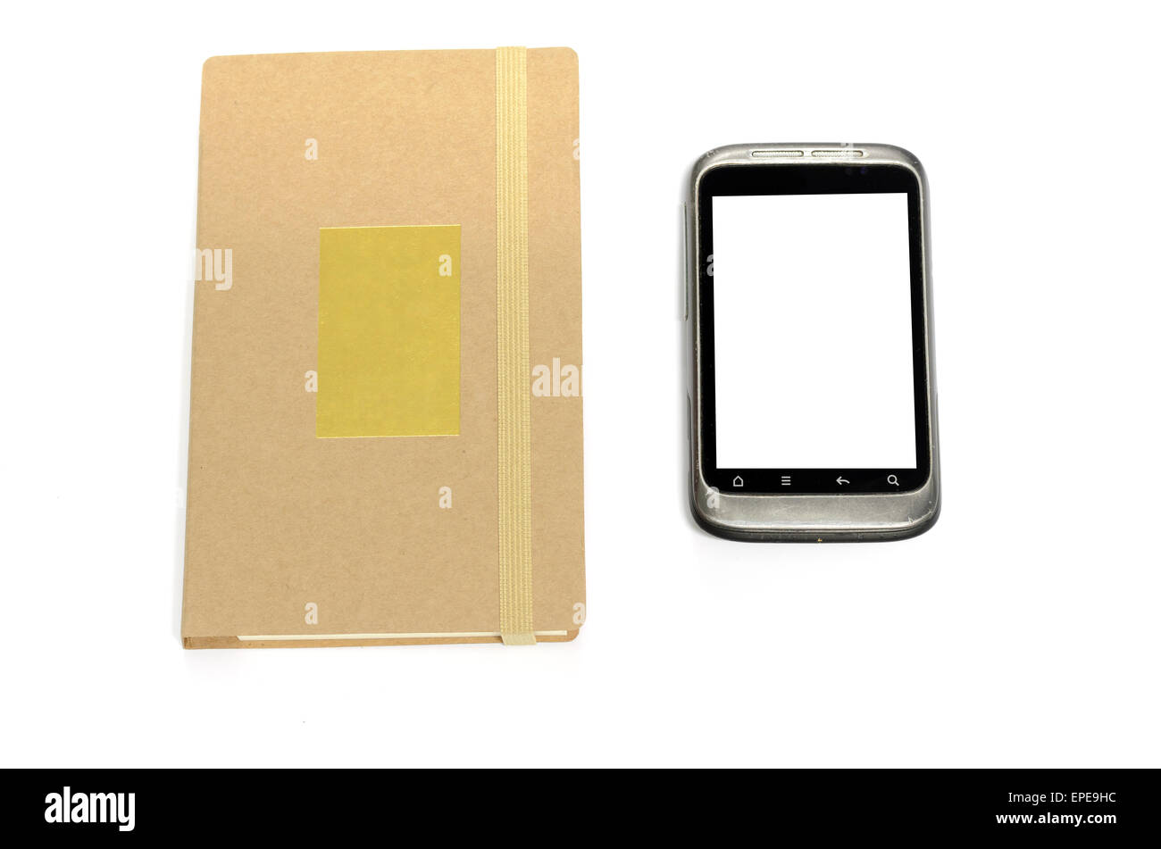 Used Android Notebook used smartphone with note book on a white background Stock Photo - Alamy