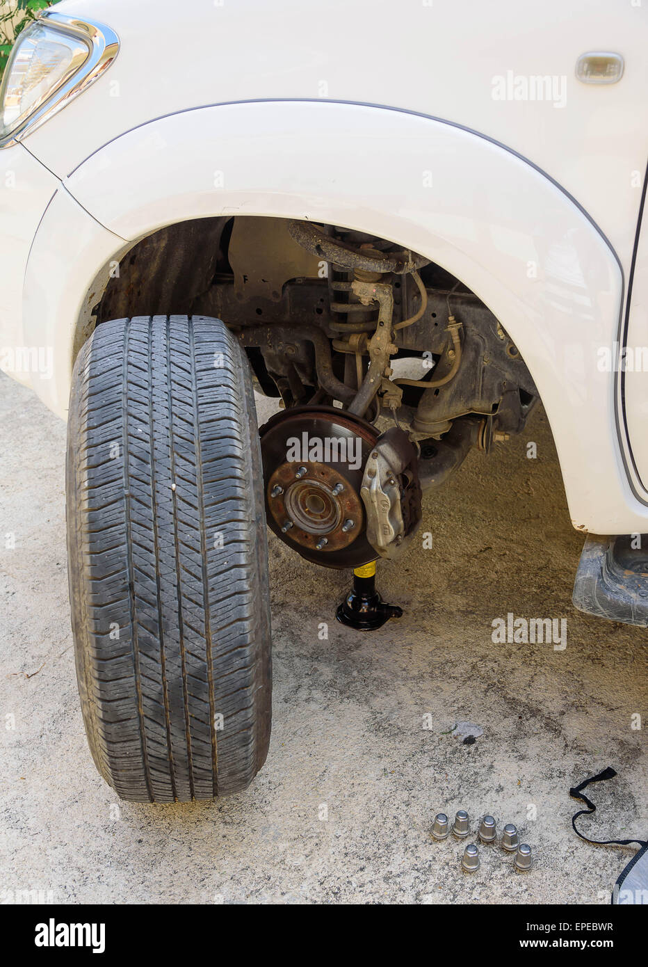 Car tire puncture, the tire change Stock Photo Alamy
