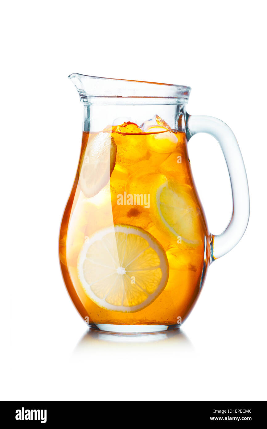 Tea with ice in a pitcher. Jug full of iced tea with lemon Stock Photo