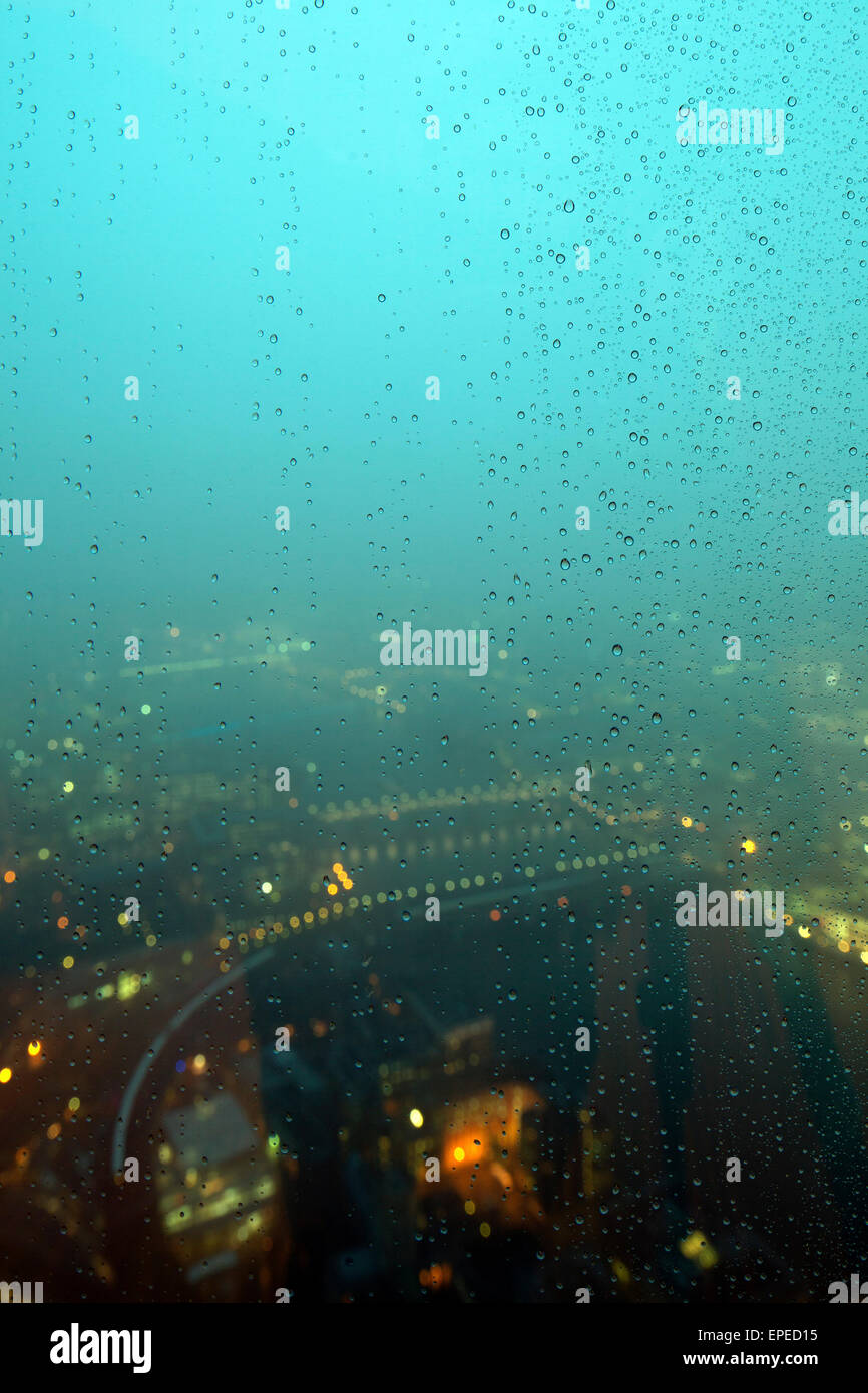 Rain drops on the window, with a foggy London behind. The Shard, London, United Kingdom. Architect: Renzo Piano Building Worksho Stock Photo