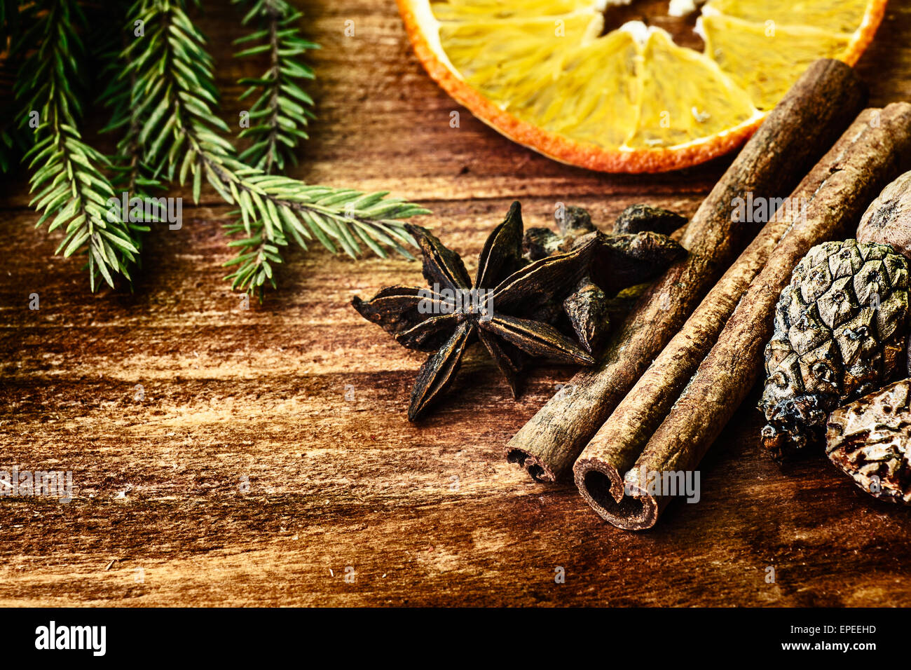 Collection of spices for mulled wine on wooden table Stock Photo