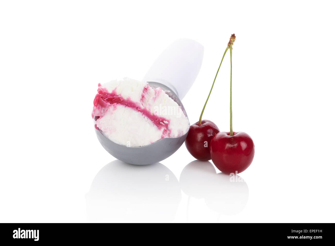 Cherry ice cream on scoop and fresh cherry fruit isolated on white background. Summer concept. Stock Photo