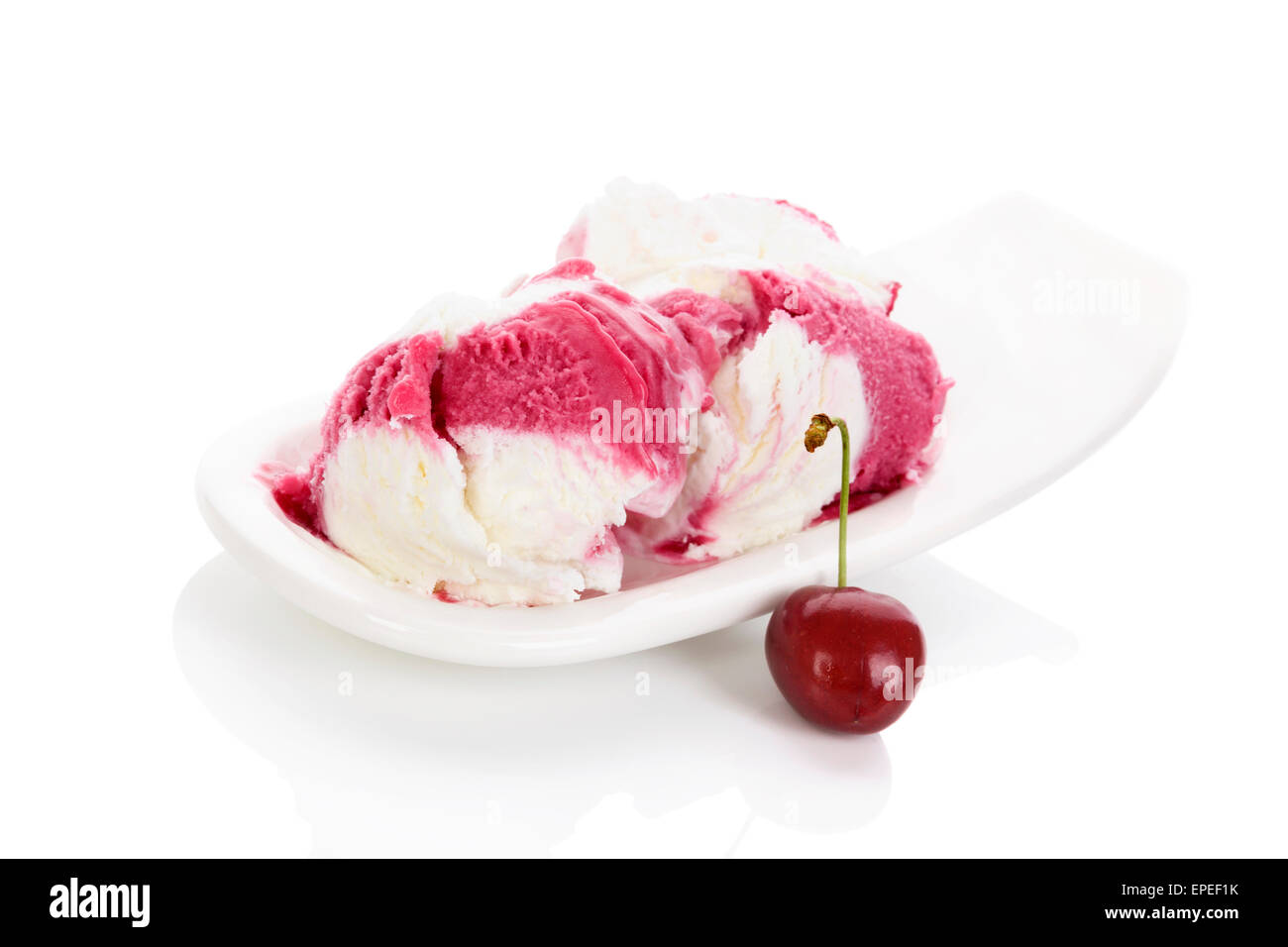 Cherry ice cream isolated on white background. Culinary fruit ice cream eating. Stock Photo