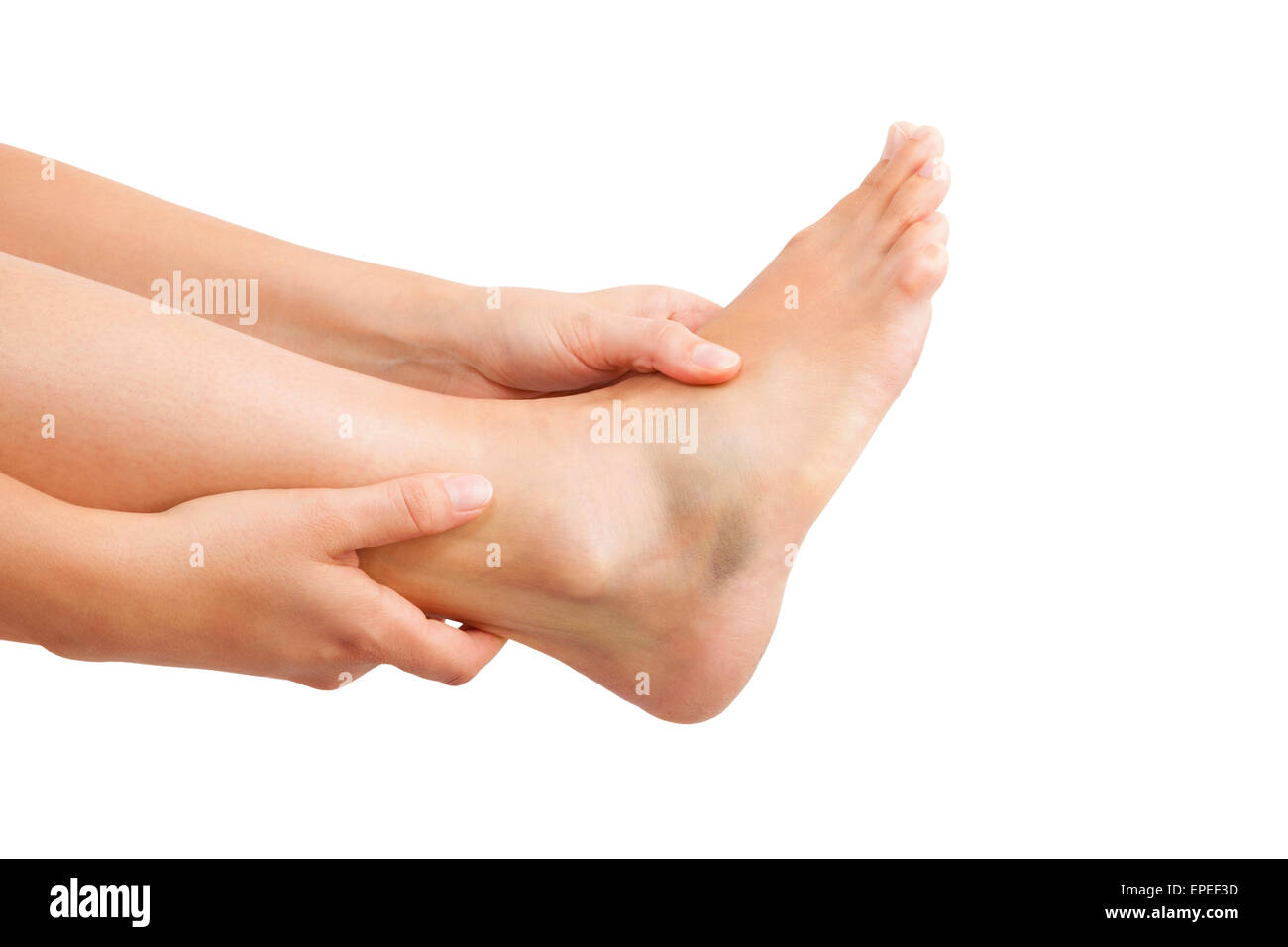 Muscle injuries and muscle strain. Female hand holding leg isolated on white background. Stock Photo