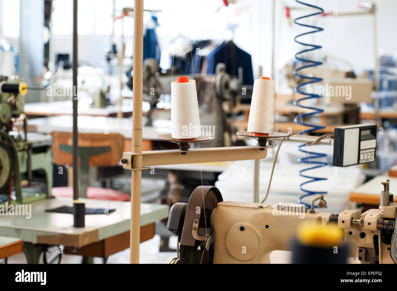 Interior Of A Deserted Tailors Shop With Work Benches And