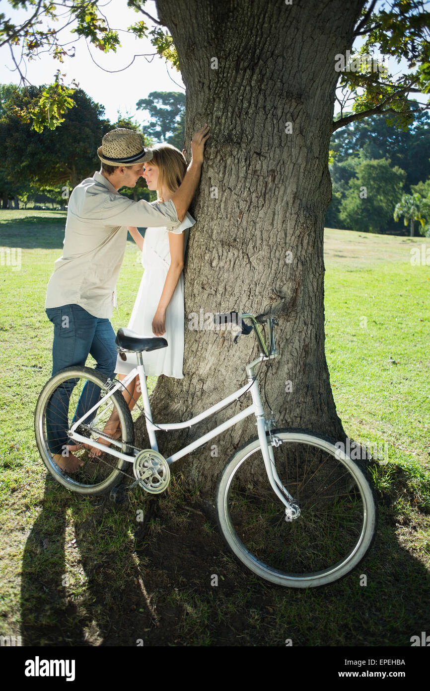 Young couple in love kissing against the light hi-res stock photography ...