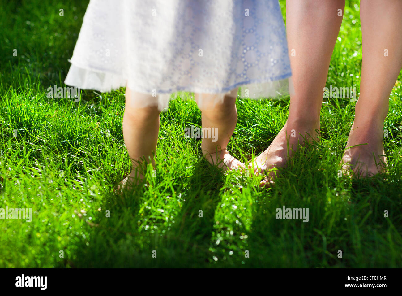 Baby first steps spring hi-res stock photography and images - Alamy