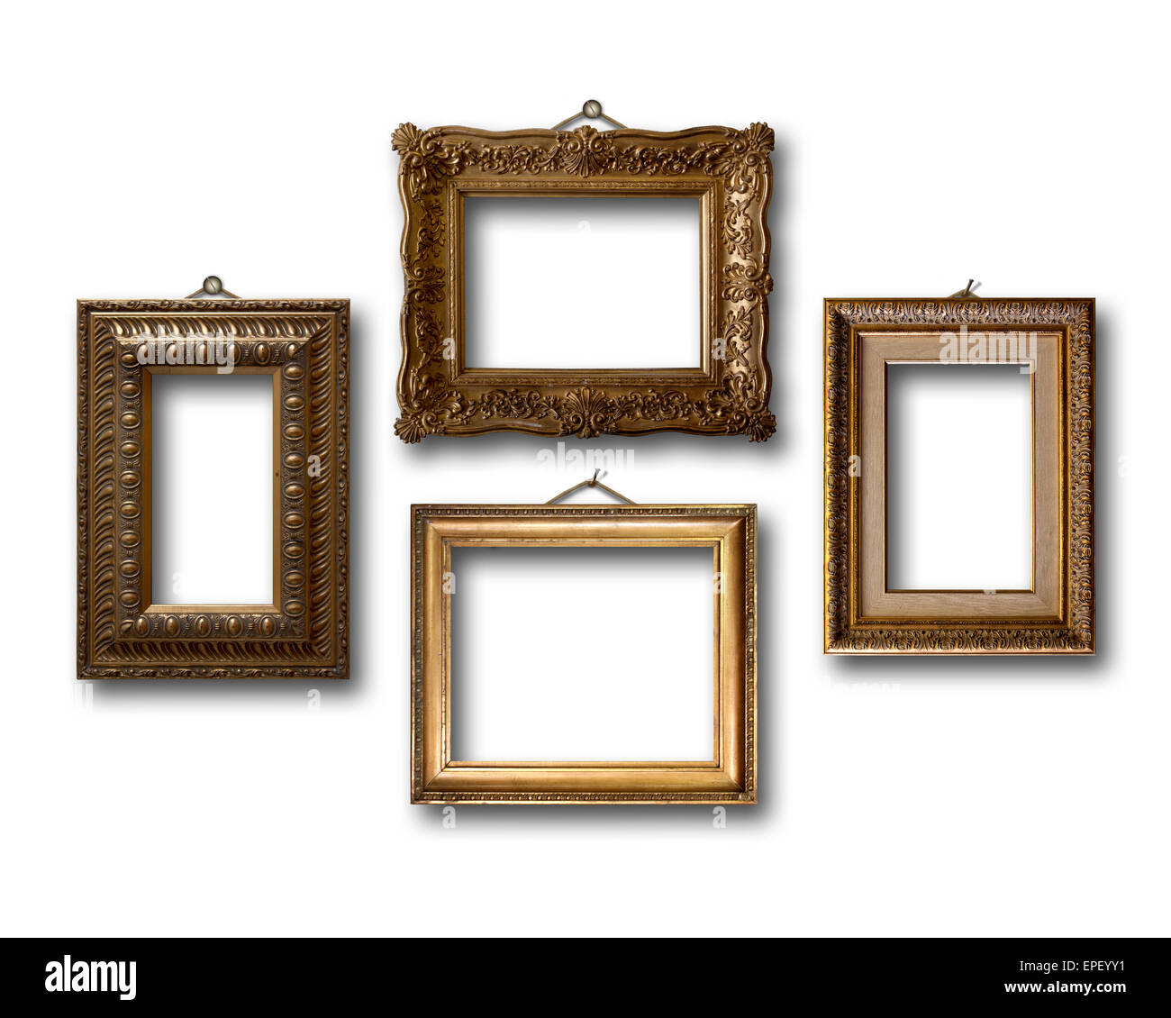 Gilded wooden frames for pictures on white isolated background Stock Photo