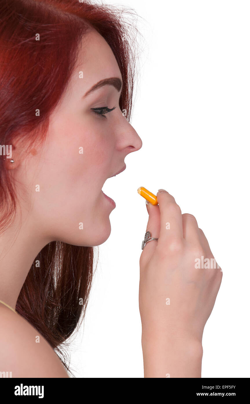 Woman Taking Pill Stock Photo