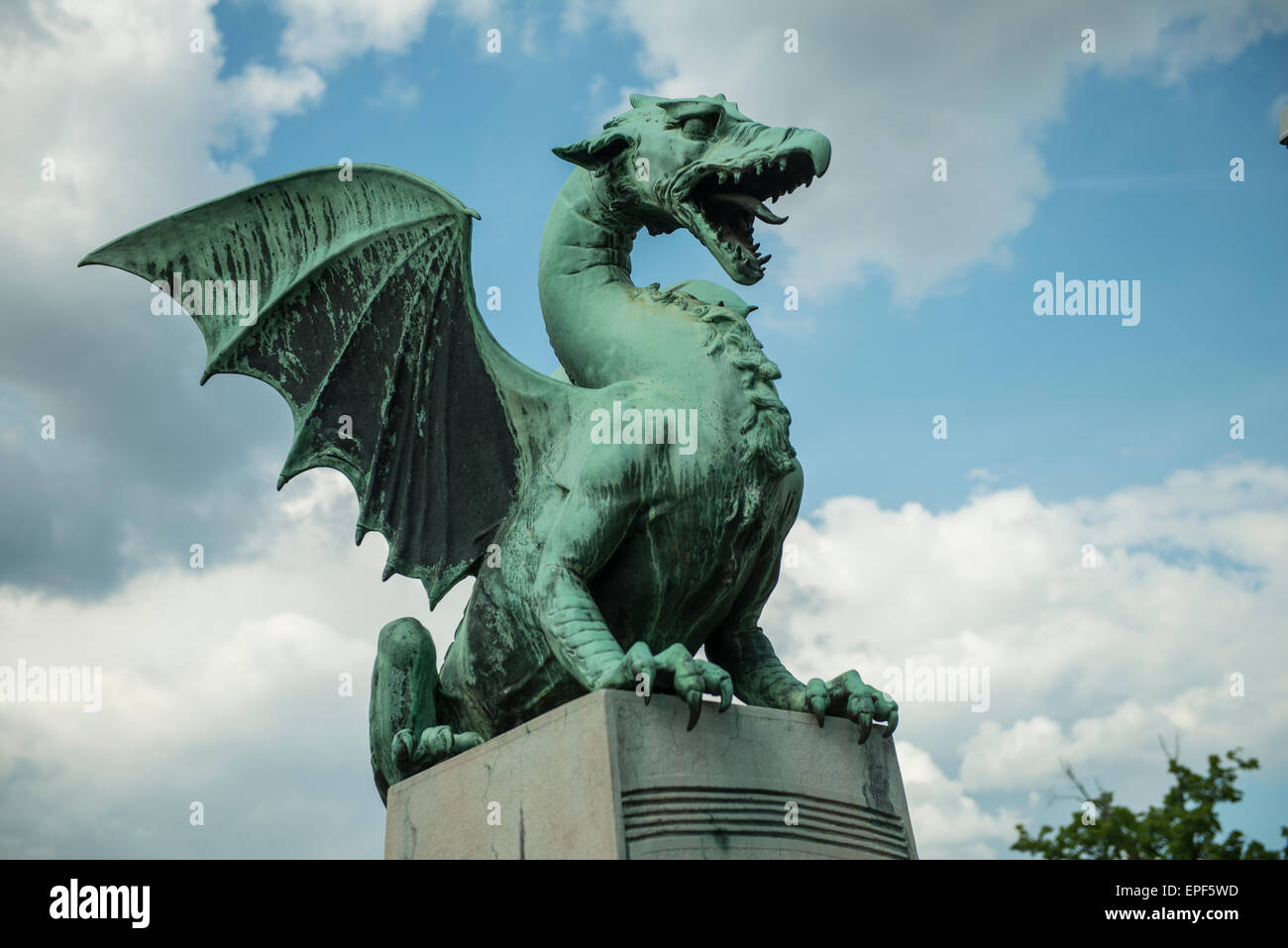 the dragon statue on the dragon bridge in Ljubljana Stock Photo