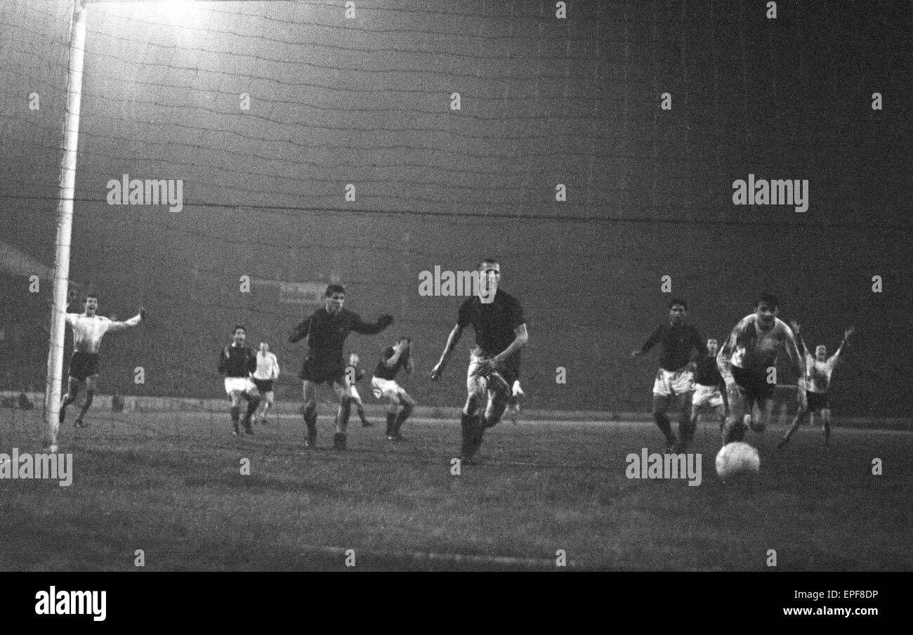 Inter Cities Fairs Cup Semi Final Second Leg match at Stamford Bridge. Chelsea 2 v Barcelona 0. (2-2 on aggregate). Anguish and despair in the Barcelona goalmouth as Chelsea players celebrate a goal. 11th May 1966. Stock Photo