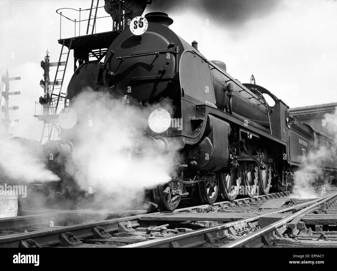 Southern Railways N15 King Arthur class locomotive 'Linette' seen here departing Waterloo Station. July 1932 Stock Photo