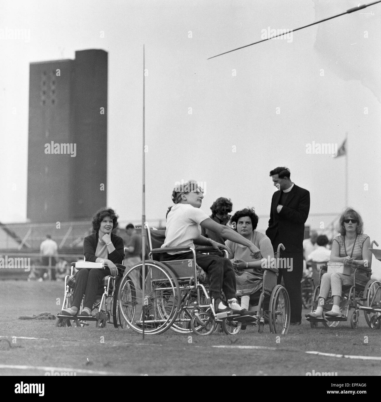Paralympic Athletes training at Stoke Mandeville, watched by patients, ahead of the 1964 Paralympics to be held in Tokyo, pictured 22nd July 1964. Stock Photo
