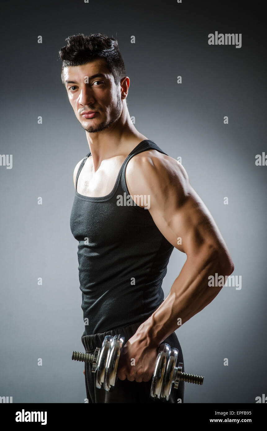 Bodybuilding Ripped Model Muscular ripped bodybuilder with dumbbells Stock Photo - Alamy