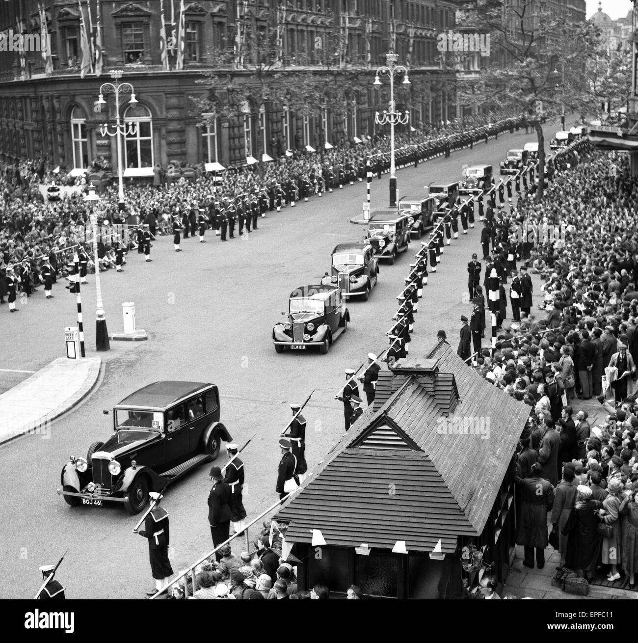 Motor-Car Procession of Royal and other Representatives of Foreign States seen here making their way down Northumberland Avenue ahead of the gold state coach carrying the Queen to Westminster Abbey for her coronation 2nd June 1952 Stock Photo