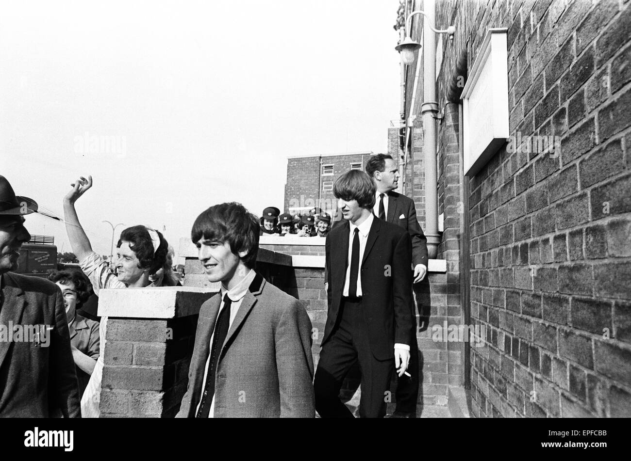 The Beatles in Liverpool for the Premier of a Hard Day's Night. George Harrison and Ringo Starr pictured here arriving in Liverpool, to be greeting by crows of screaming girls. 10th July 1964. Stock Photo