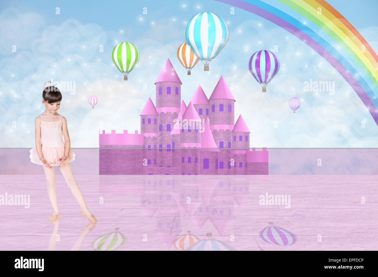 Little balerina in front of a pink fairy castle Stock Photo