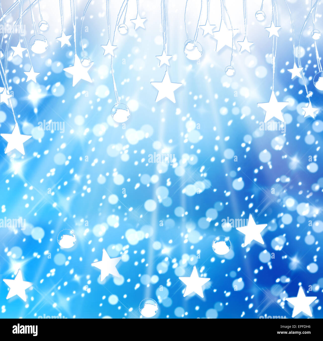 Christmas snowy background with blue and white stars Stock Photo