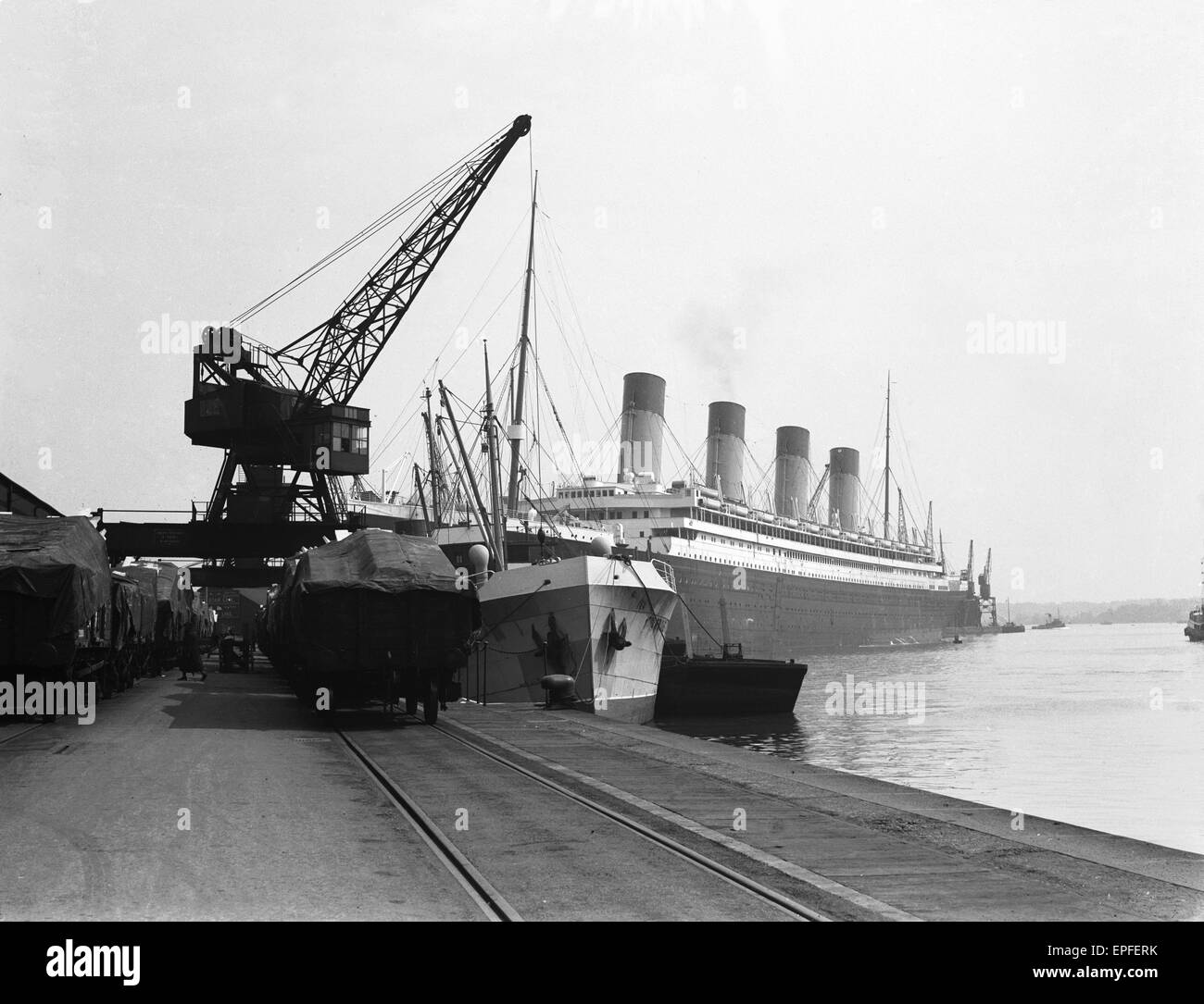 White Star Line liner RMS Olympic, sistership of the ill fated Titanic seen here in Southampton docks for her yearly refit circa November 1932 Stock Photo