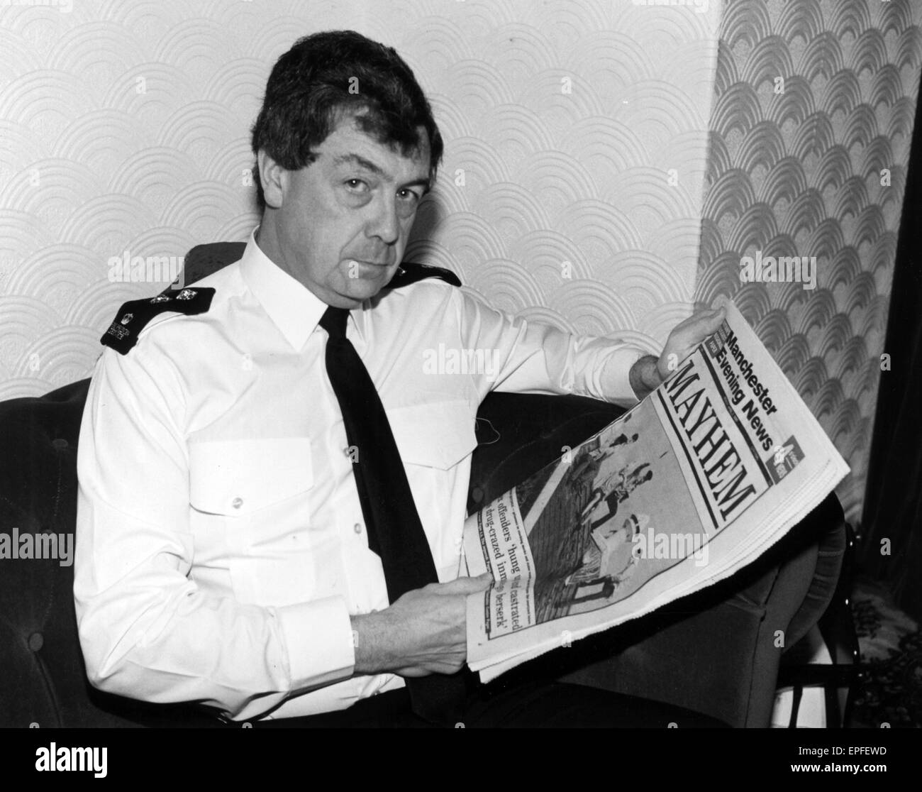 Strangeways Prison Riot April 1990. Prison Officer Peter H with copy of MEN Newspaper.  A 25-day prison riot and rooftop protest at Strangeways Prison in Manchester, England. The riot began on the 1st April 1990 when prisoners took control of the prison c Stock Photo