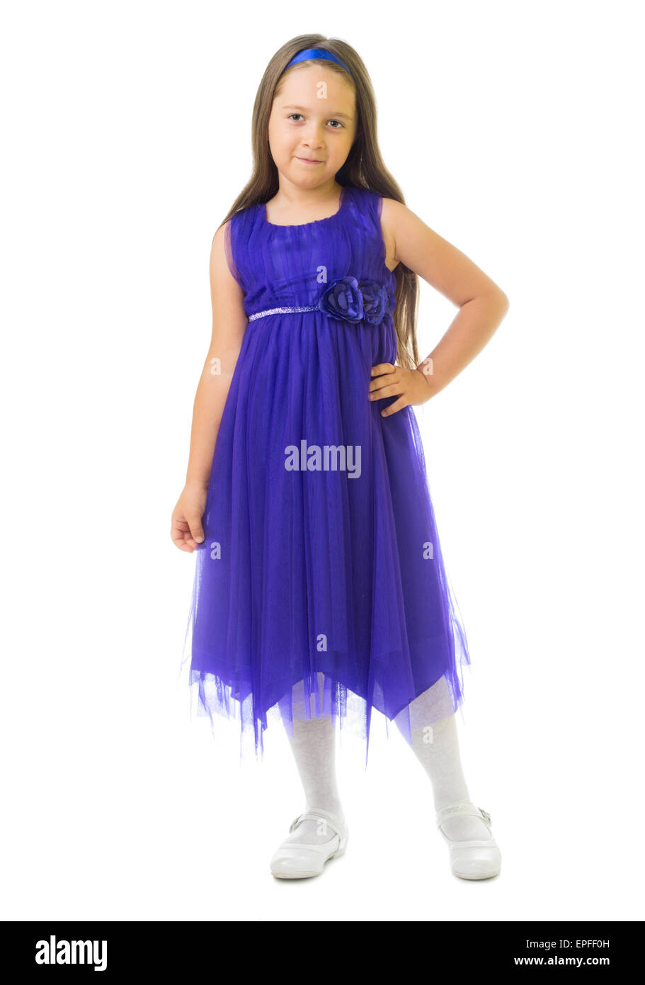 Little girl in blue dress isolated Stock Photo Alamy
