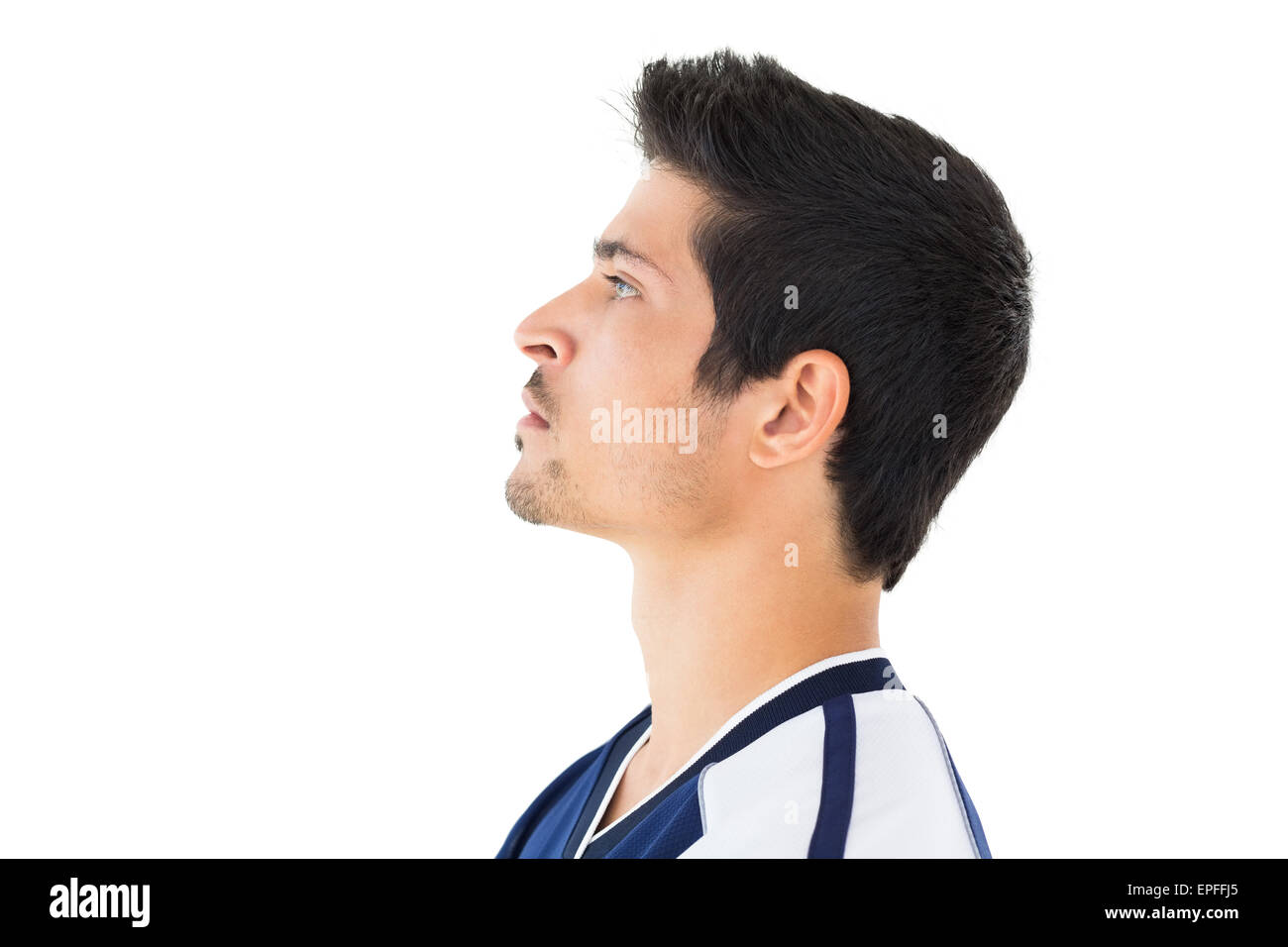 Side view of football player looking up Stock Photo - Alamy