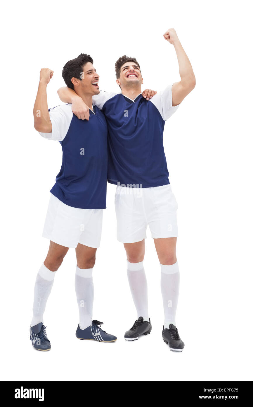 Football players celebrating a win Stock Photo Alamy