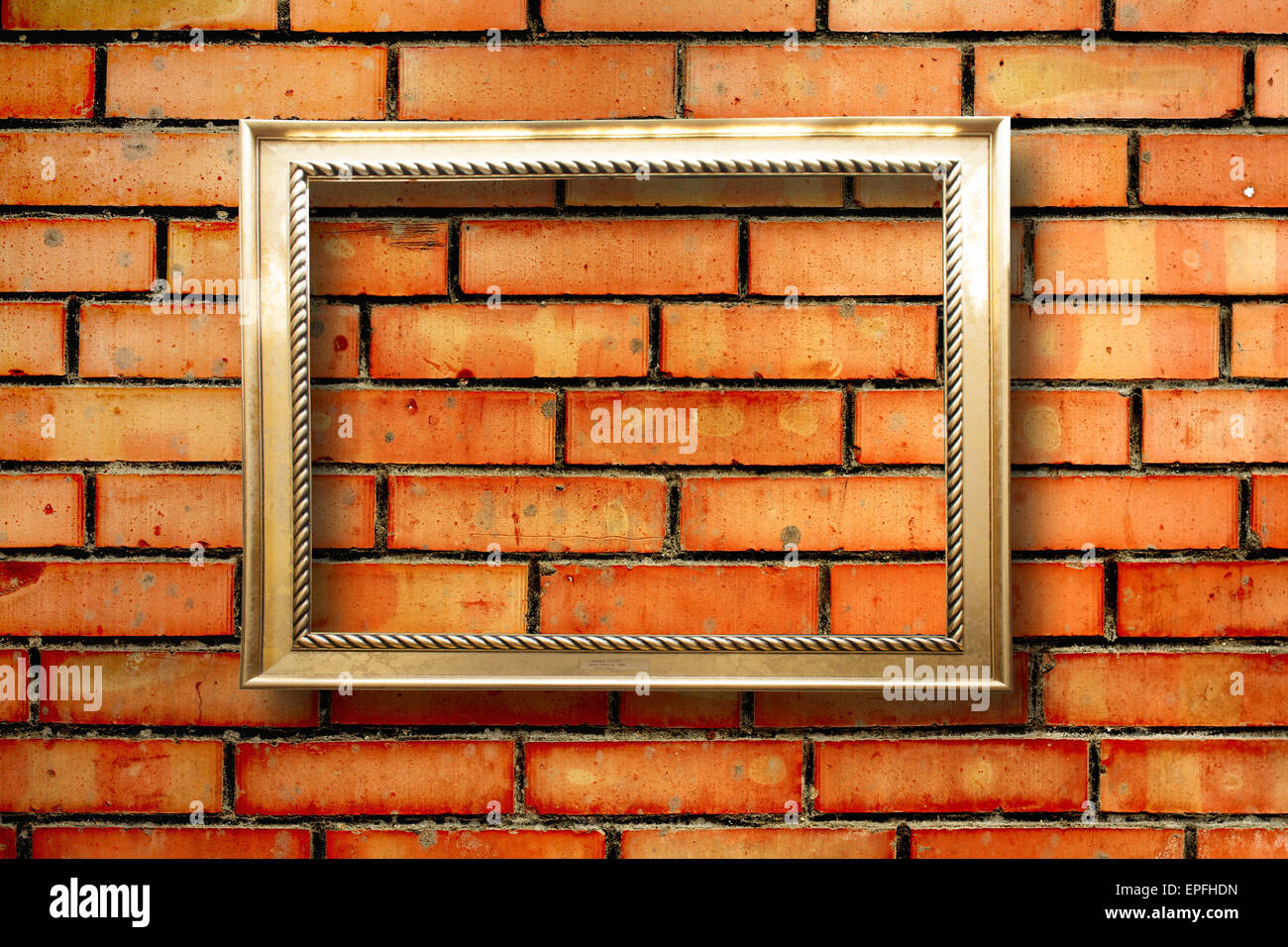 Vintage wooden frames for pictures on old brick wall Stock Photo - Alamy