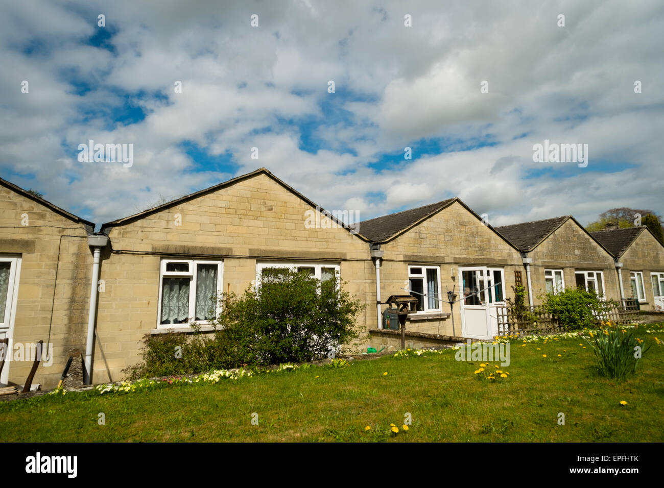 A row of small bungalow style homes for the elderly in Cirencester, Gloucestershire, England UK Stock Photo