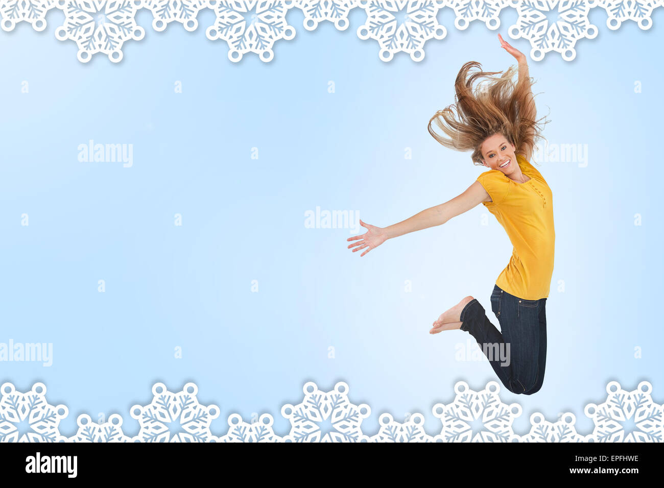 Woman celebrating jumping winter hi-res stock photography and images ...