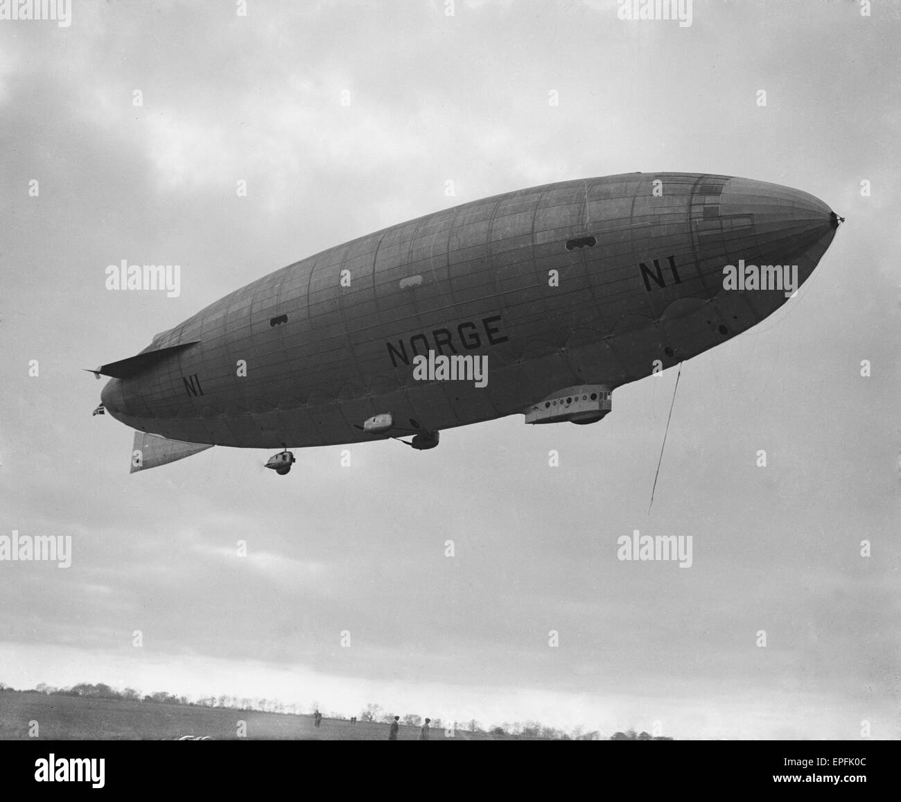 The Italian-built airship Norge, piloted by Colonel Umberto Nobile, and George Herbert Scott seen here landing at Pulham en route to making the first crossing of the North Pole. 11th April 1924 Stock Photo