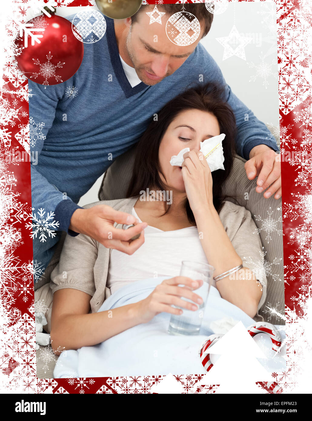 Handsome man taking care of his sick girlfriend Stock Photo