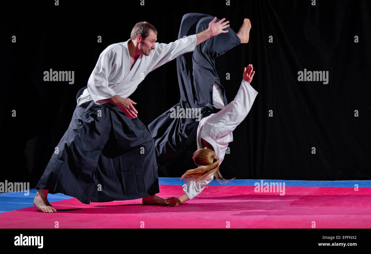 Two martial arts fighters on black Stock Photo