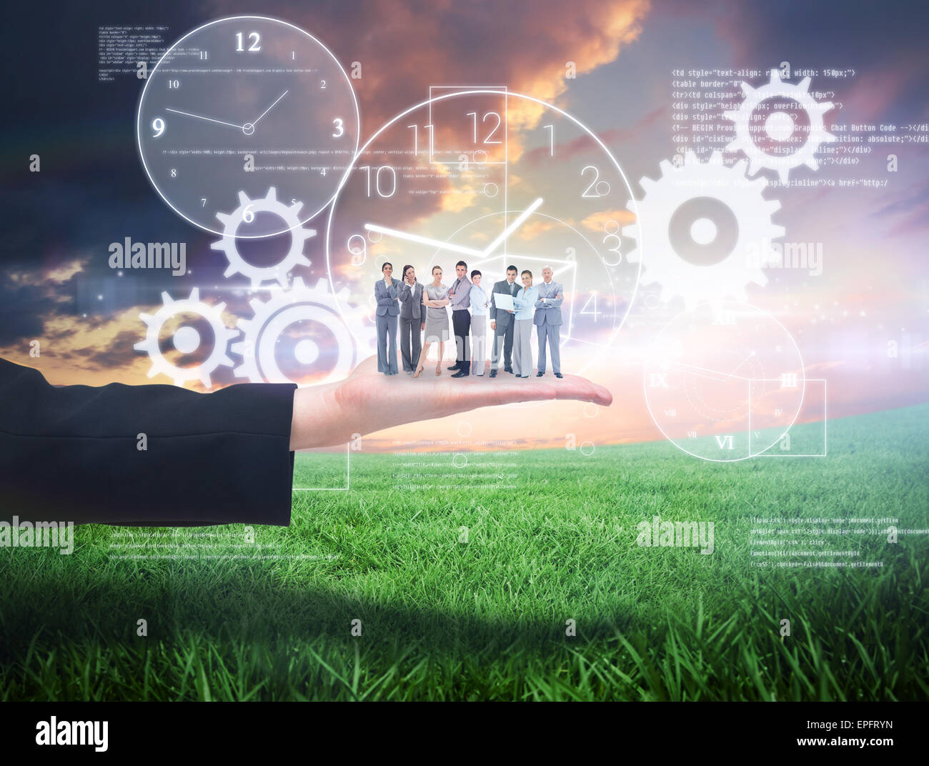 Composite image of business team looking at camera Stock Photo - Alamy